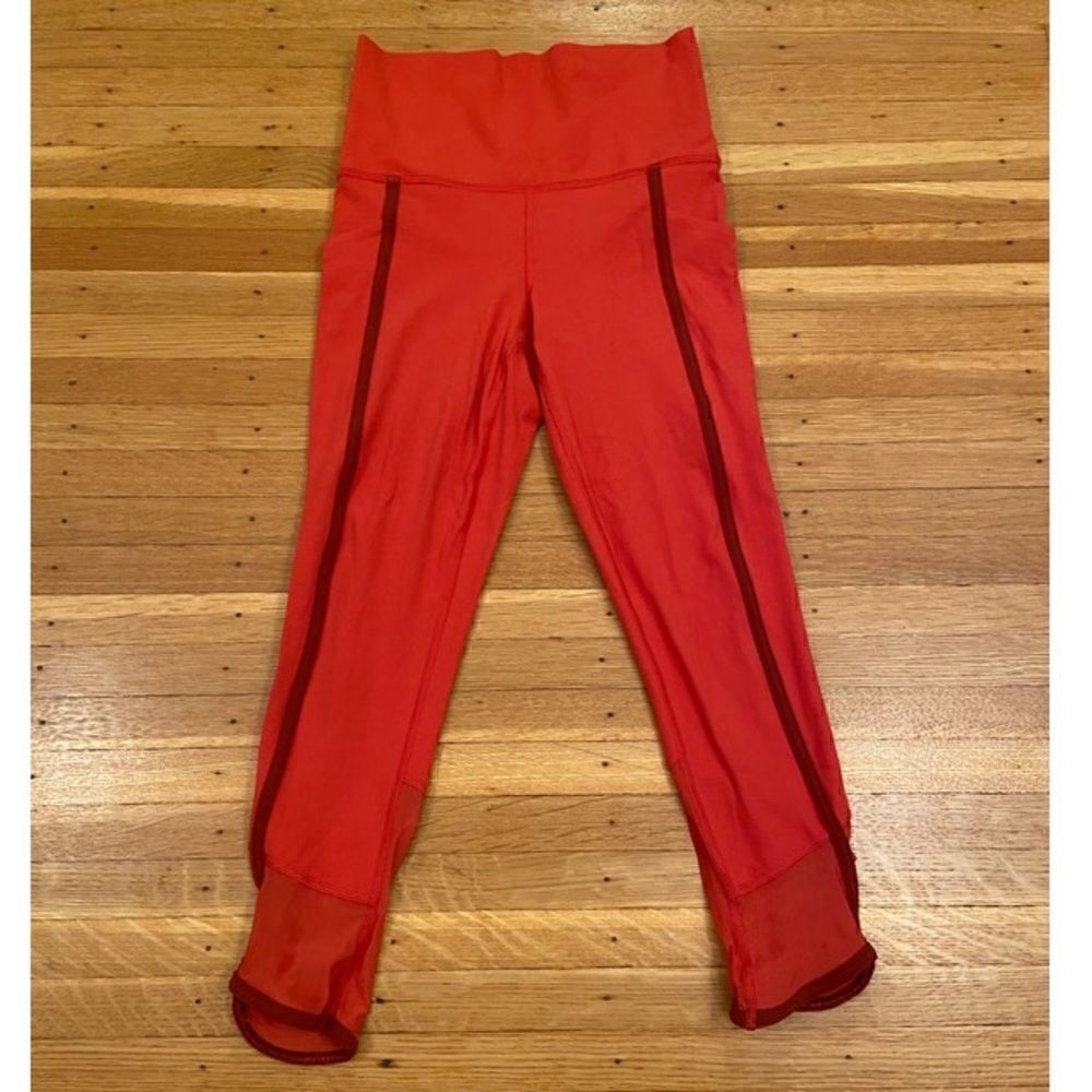 Athleta red/pink Salutation Stash Pocket II Capri mesh leggings